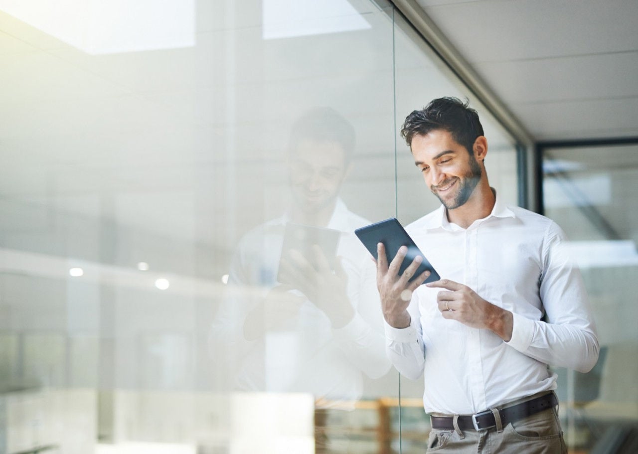 Man looking on the Tablet